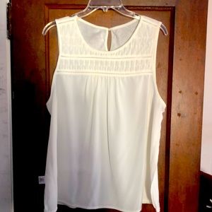 White sleeveless shirt